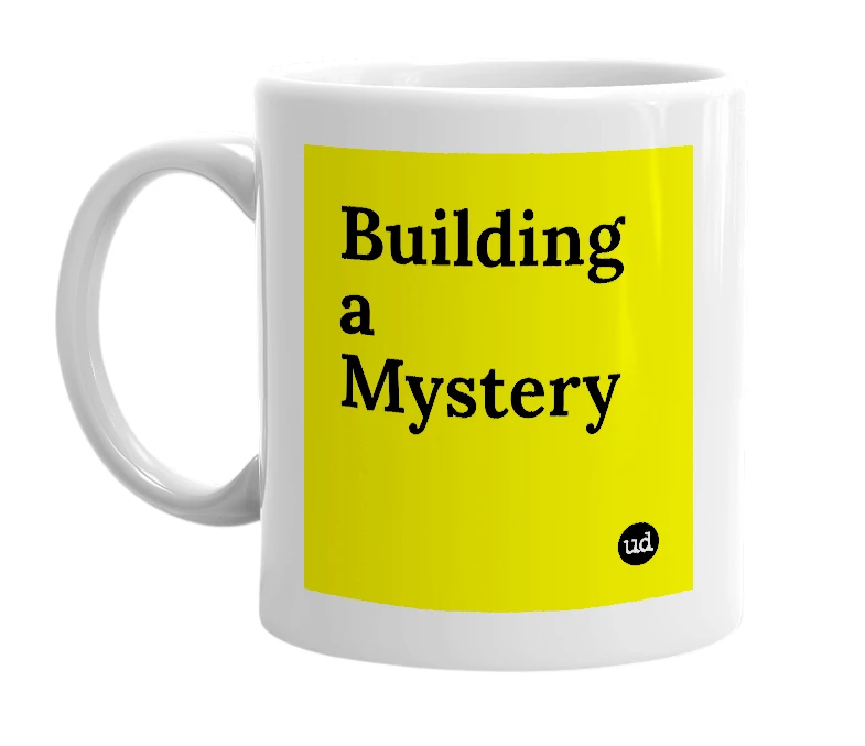 White mug with 'Building a Mystery' in bold black letters
