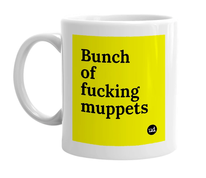 White mug with 'Bunch of fucking muppets' in bold black letters