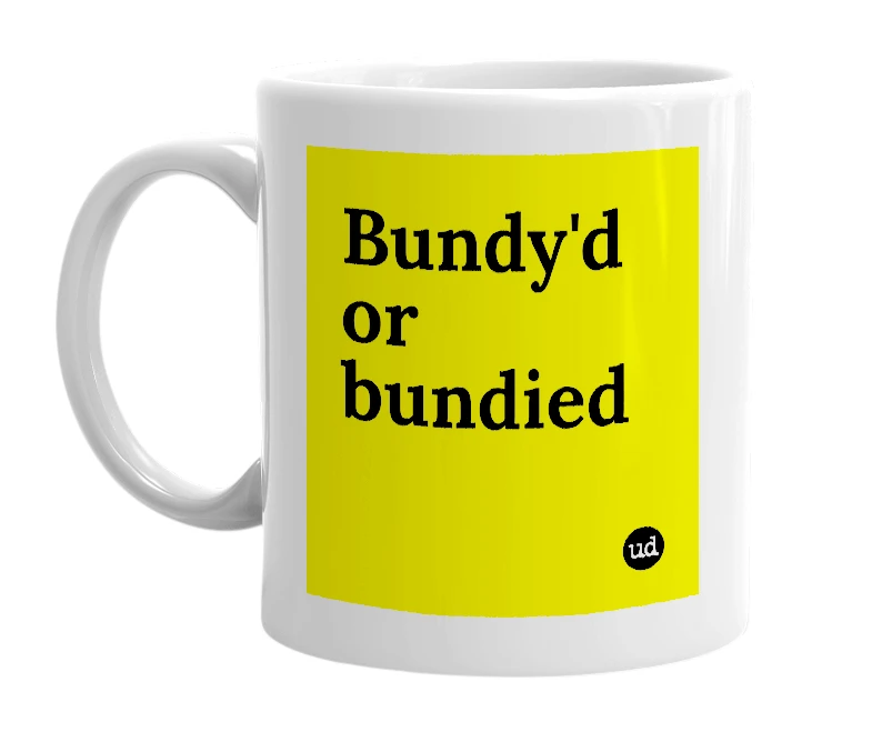 White mug with 'Bundy'd or bundied' in bold black letters