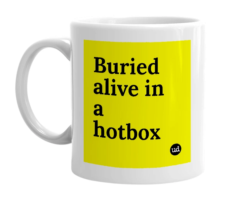 White mug with 'Buried alive in a hotbox' in bold black letters