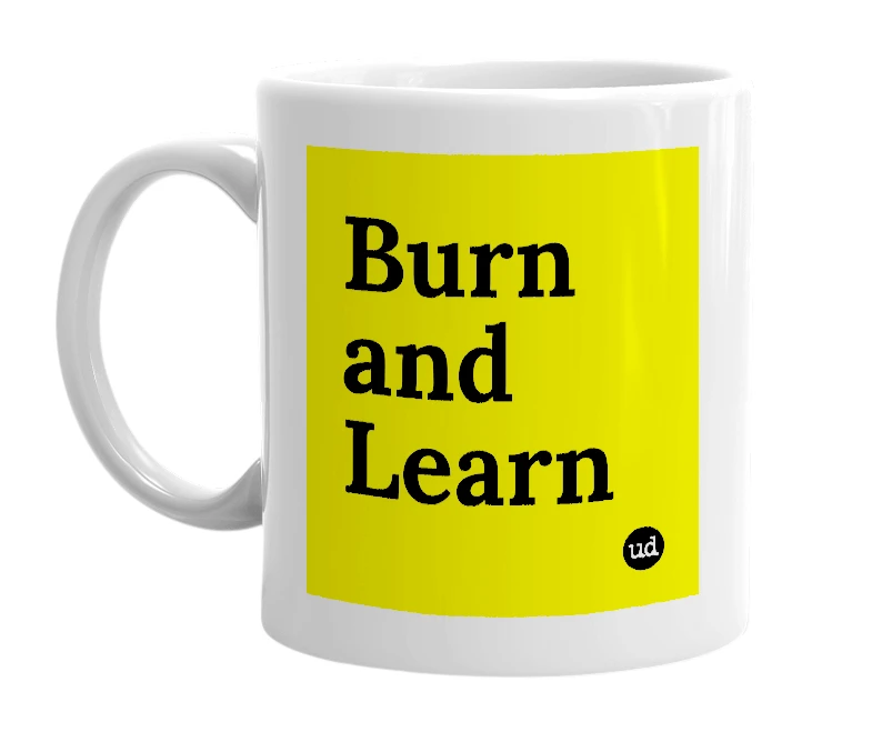 White mug with 'Burn and Learn' in bold black letters