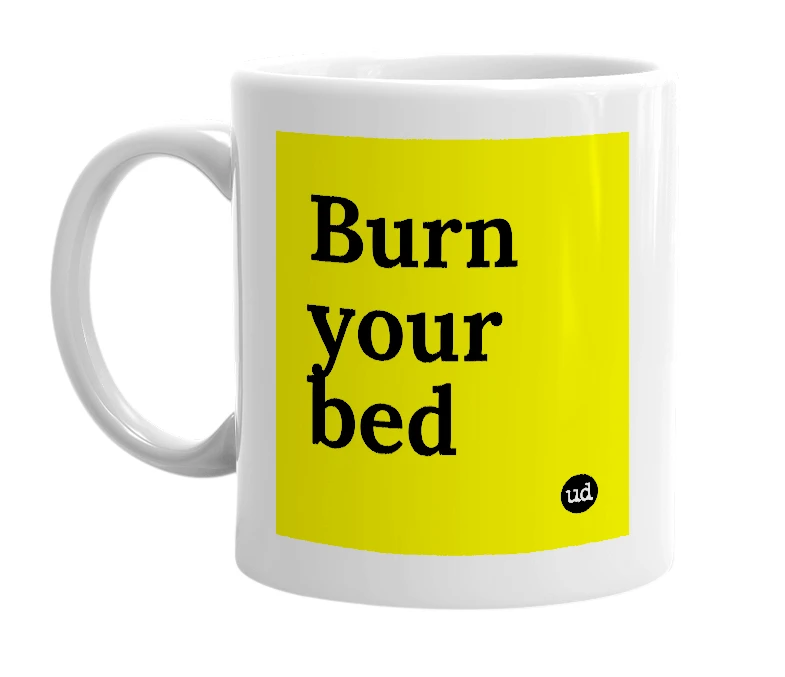 White mug with 'Burn your bed' in bold black letters