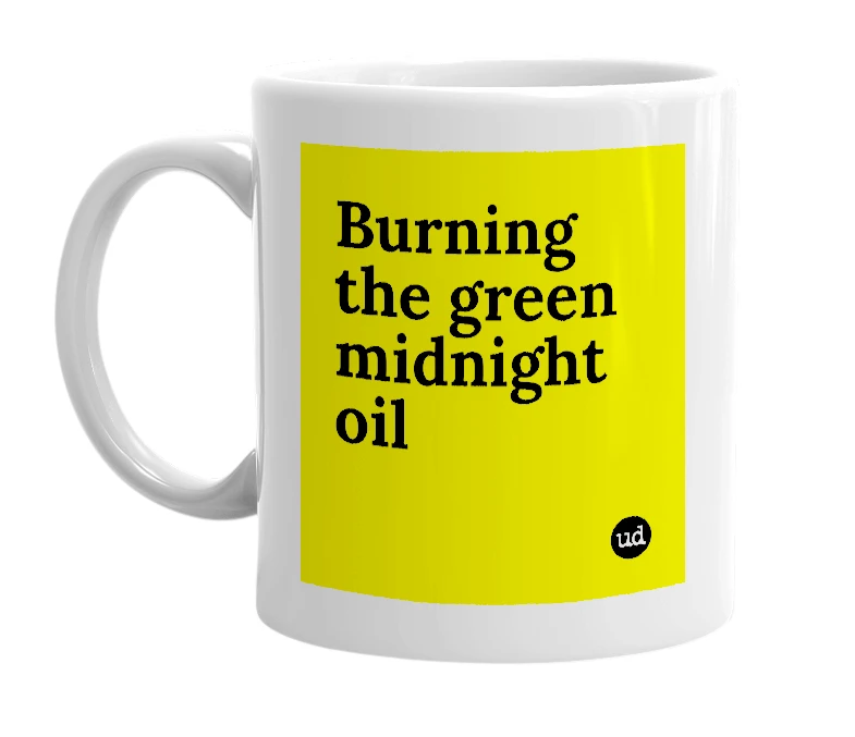 White mug with 'Burning the green midnight oil' in bold black letters