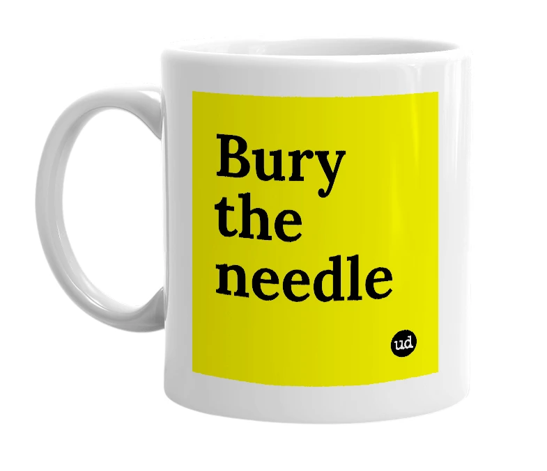 White mug with 'Bury the needle' in bold black letters