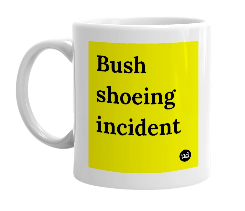 White mug with 'Bush shoeing incident' in bold black letters