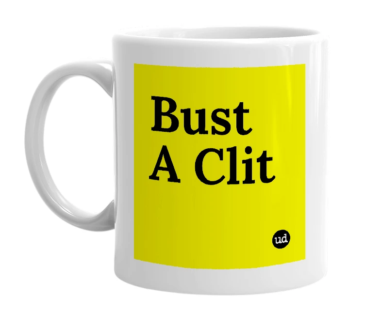White mug with 'Bust A Clit' in bold black letters