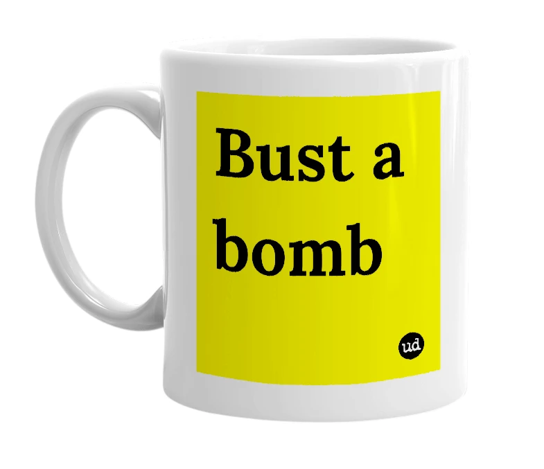White mug with 'Bust a bomb' in bold black letters
