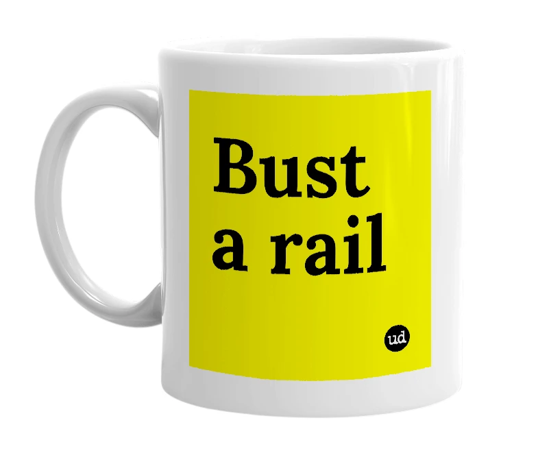 White mug with 'Bust a rail' in bold black letters