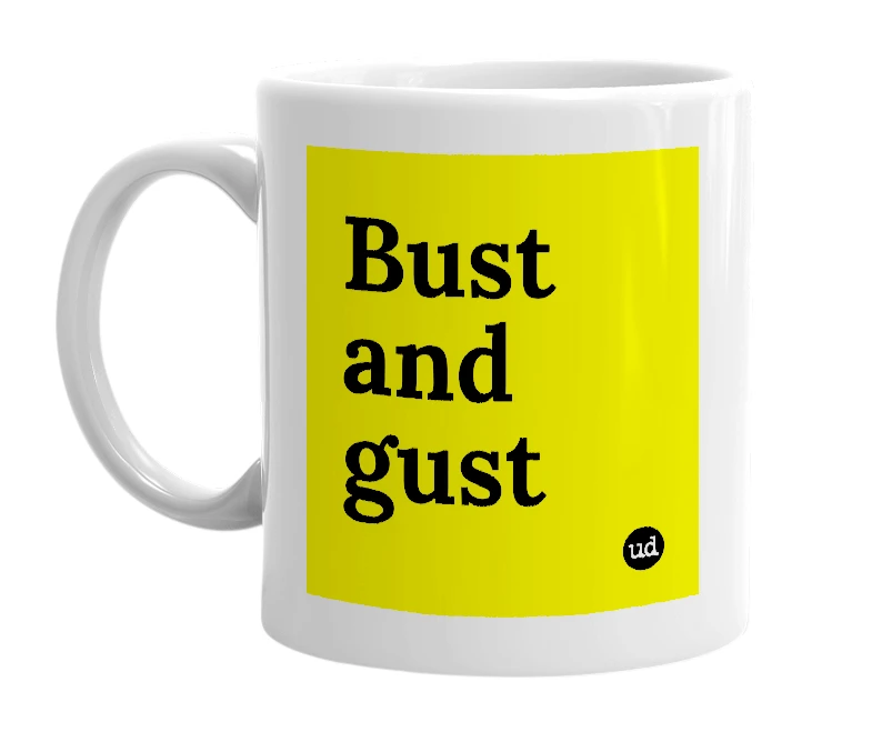 White mug with 'Bust and gust' in bold black letters
