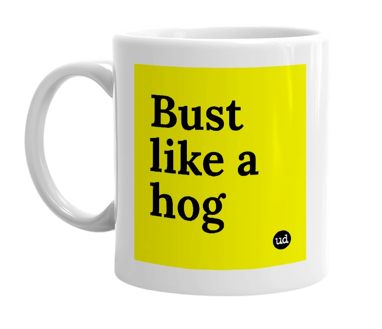 White mug with 'Bust like a hog' in bold black letters