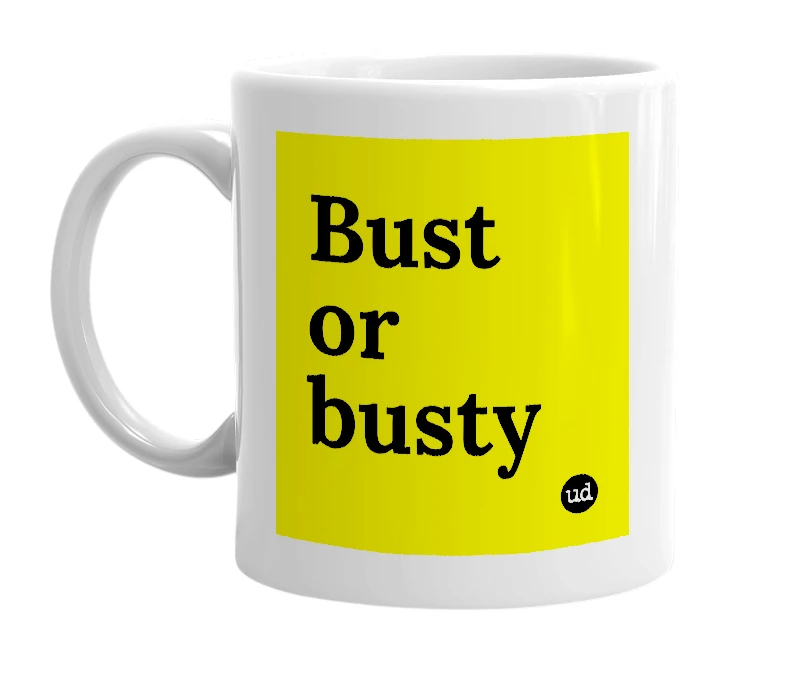 White mug with 'Bust or busty' in bold black letters