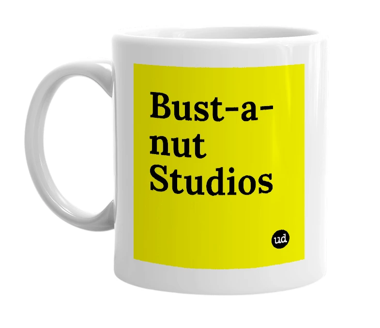 White mug with 'Bust-a-nut Studios' in bold black letters