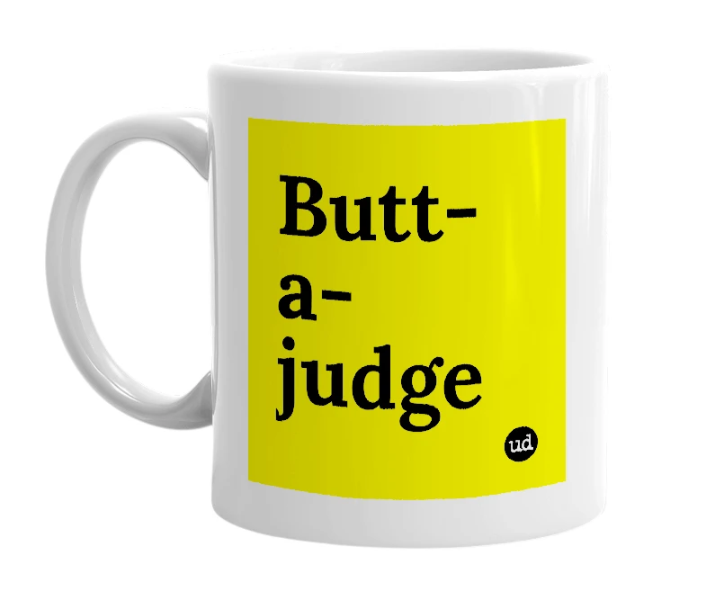 White mug with 'Butt-a-judge' in bold black letters