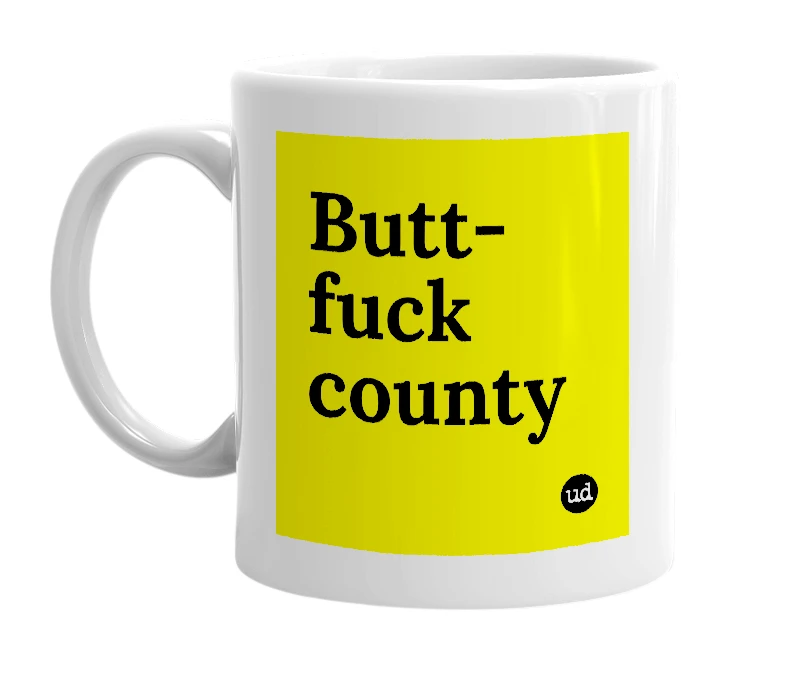 White mug with 'Butt-fuck county' in bold black letters