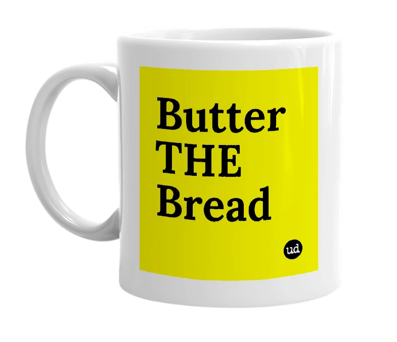 White mug with 'Butter THE Bread' in bold black letters