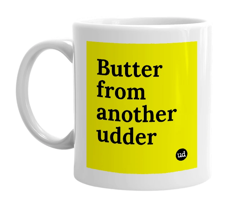 White mug with 'Butter from another udder' in bold black letters
