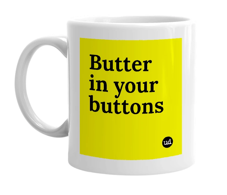 White mug with 'Butter in your buttons' in bold black letters