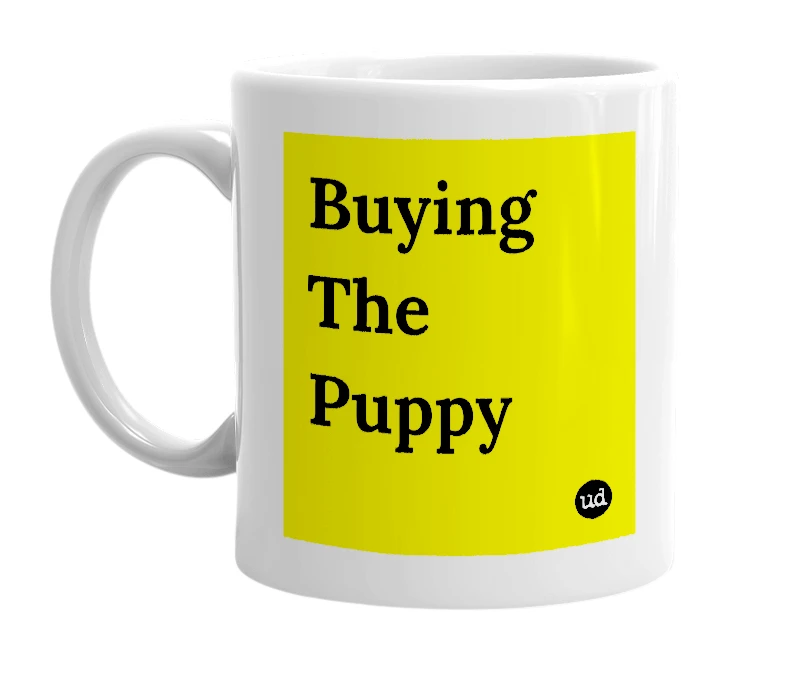 White mug with 'Buying The Puppy' in bold black letters