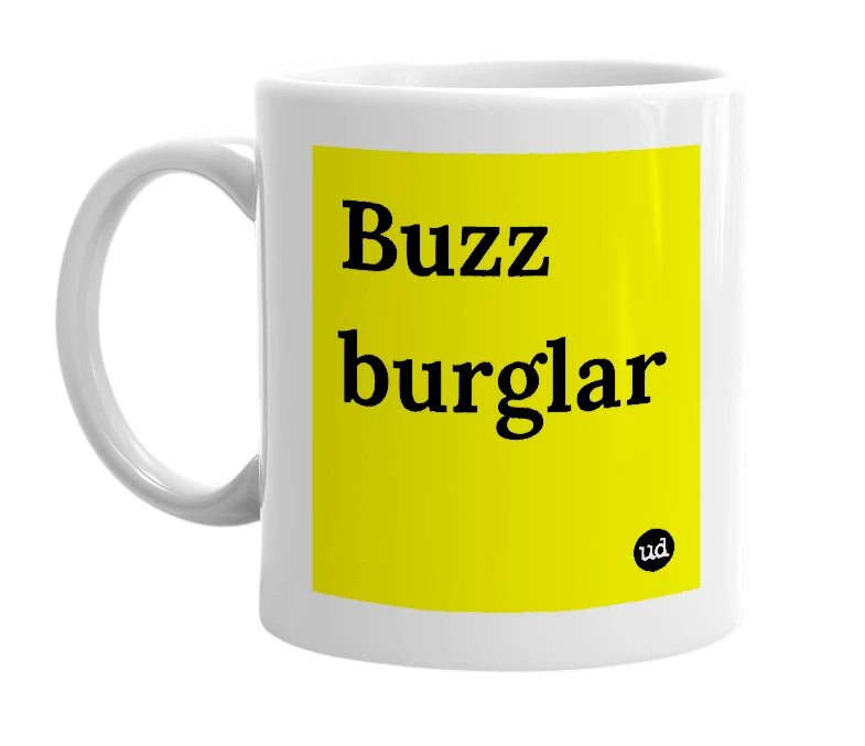 White mug with 'Buzz burglar' in bold black letters