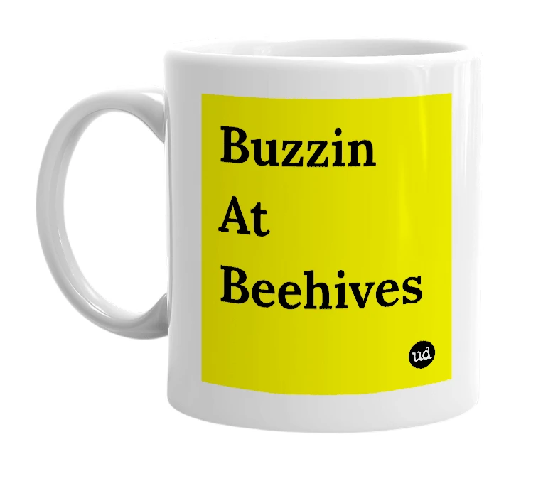 White mug with 'Buzzin At Beehives' in bold black letters