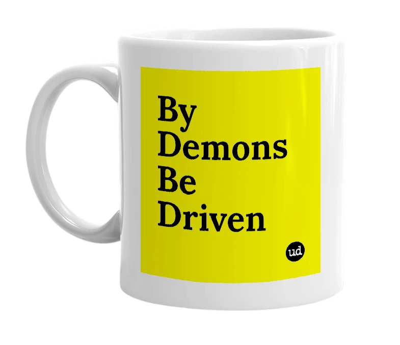 White mug with 'By Demons Be Driven' in bold black letters