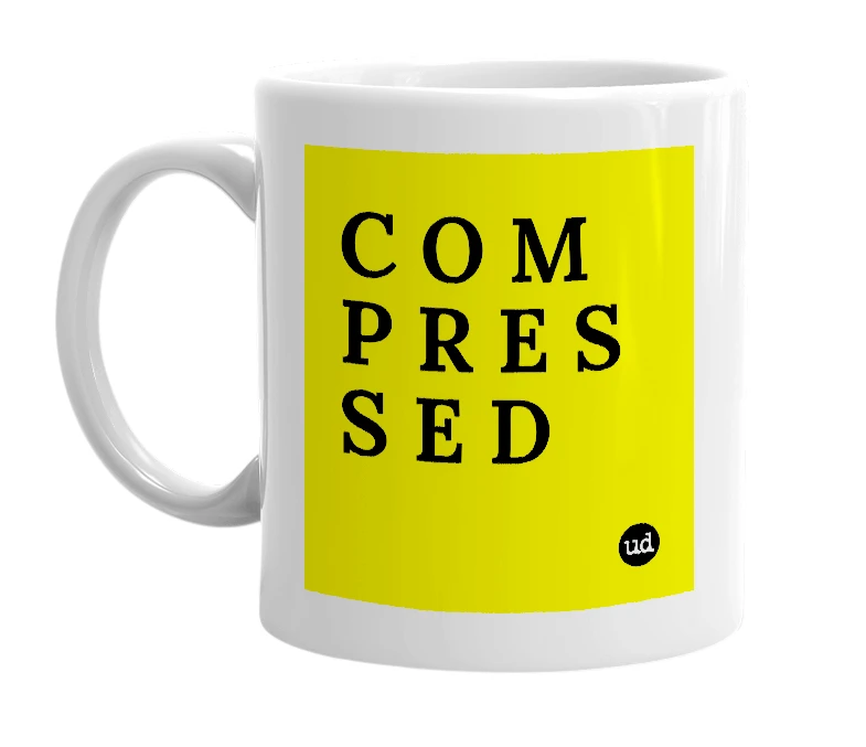 White mug with 'C O M P R E S S E D' in bold black letters