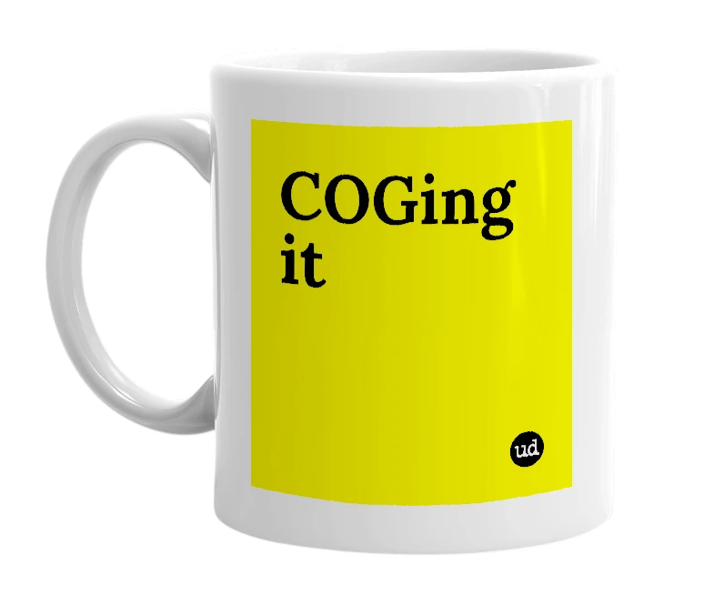 White mug with 'COGing it' in bold black letters