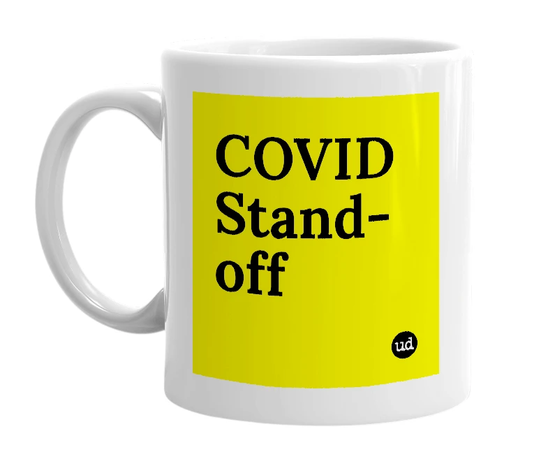 White mug with 'COVID Stand-off' in bold black letters