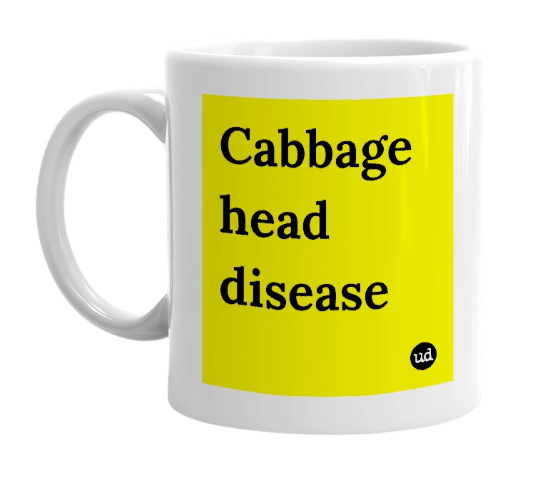 White mug with 'Cabbage head disease' in bold black letters