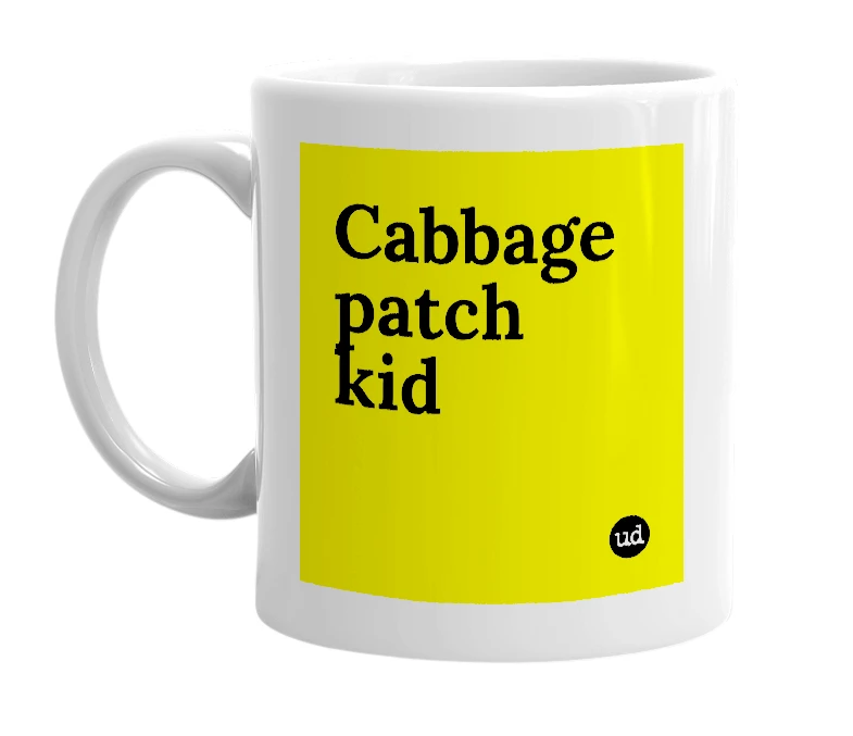 White mug with 'Cabbage patch kid' in bold black letters