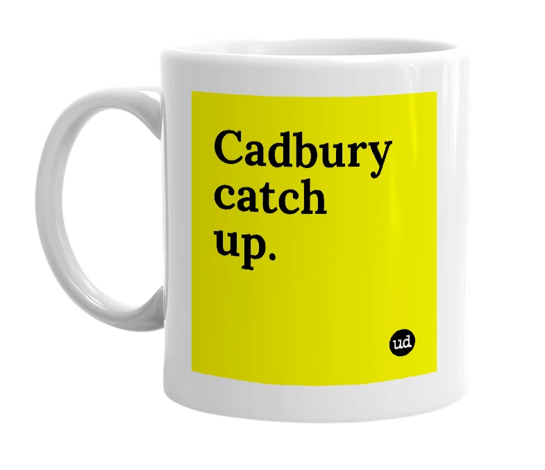 White mug with 'Cadbury catch up.' in bold black letters