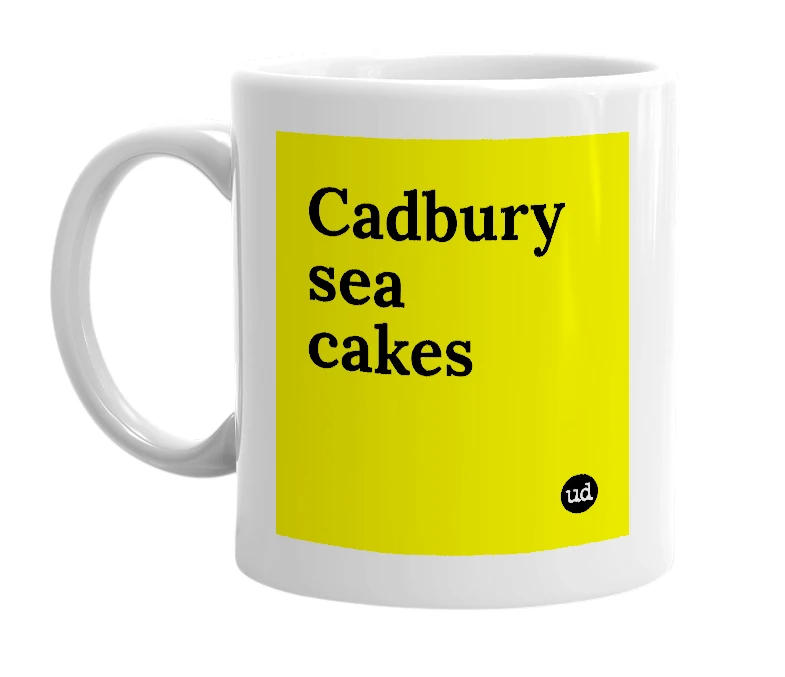 White mug with 'Cadbury sea cakes' in bold black letters
