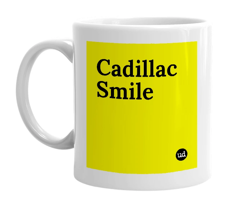 White mug with 'Cadillac Smile' in bold black letters