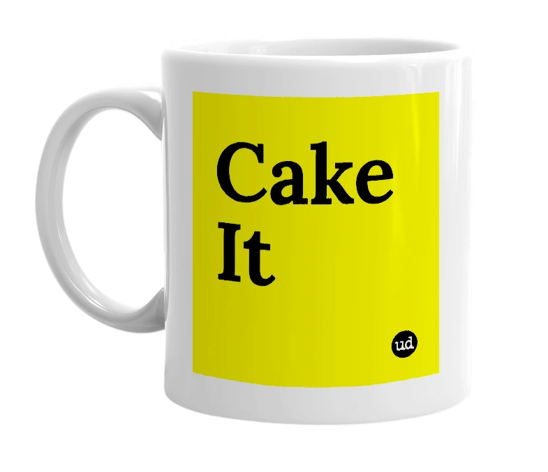 White mug with 'Cake It' in bold black letters