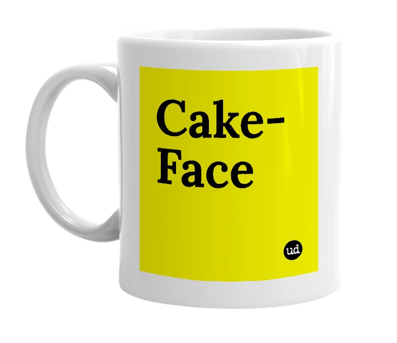 White mug with 'Cake-Face' in bold black letters