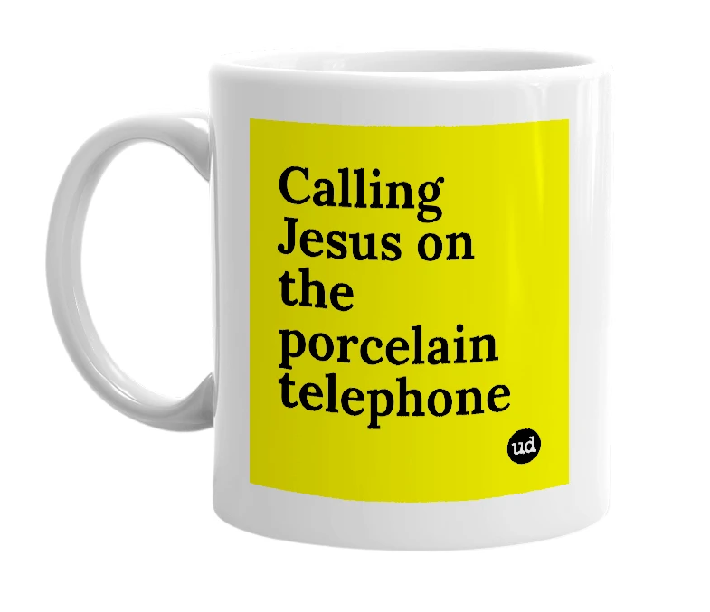 White mug with 'Calling Jesus on the porcelain telephone' in bold black letters