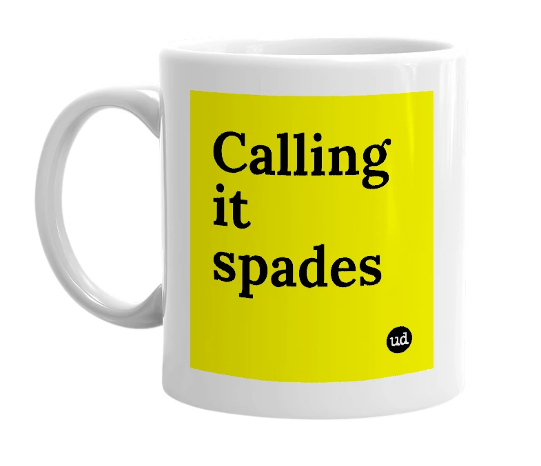 White mug with 'Calling it spades' in bold black letters
