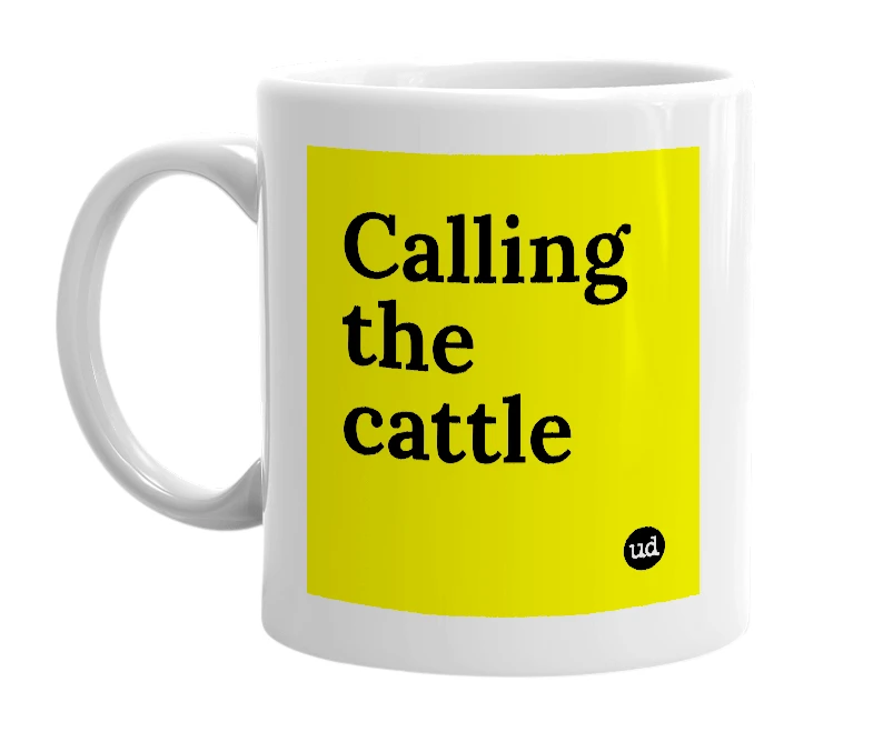 White mug with 'Calling the cattle' in bold black letters