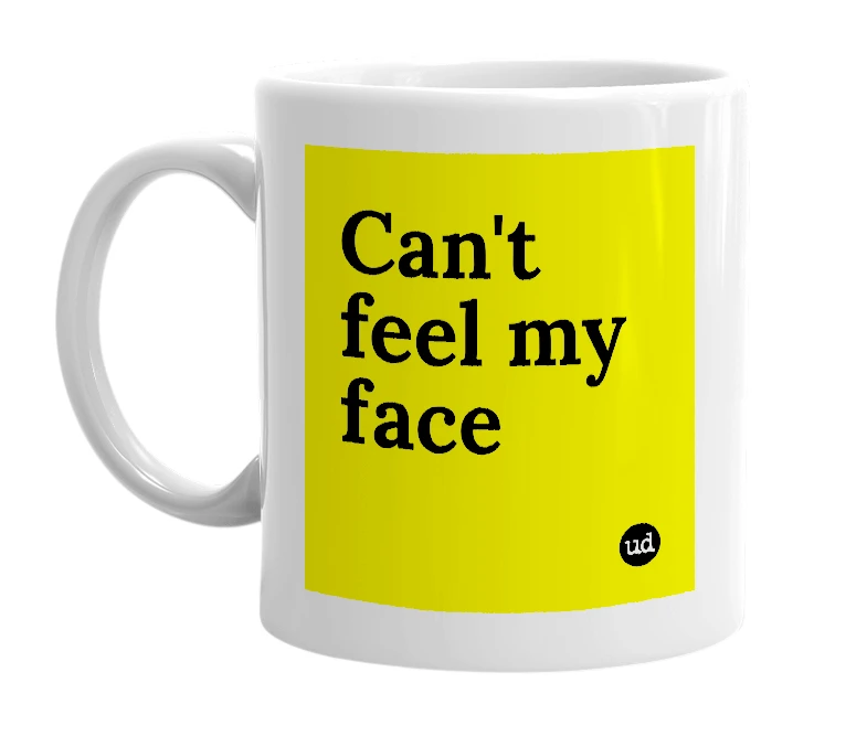 White mug with 'Can't feel my face' in bold black letters