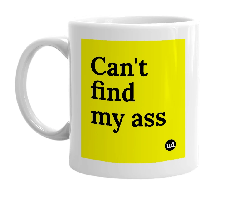 White mug with 'Can't find my ass' in bold black letters