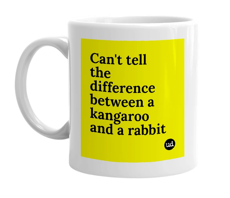 White mug with 'Can't tell the difference between a kangaroo and a rabbit' in bold black letters