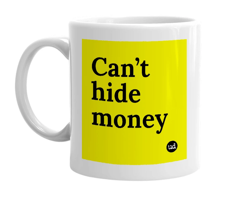 White mug with 'Can’t hide money' in bold black letters