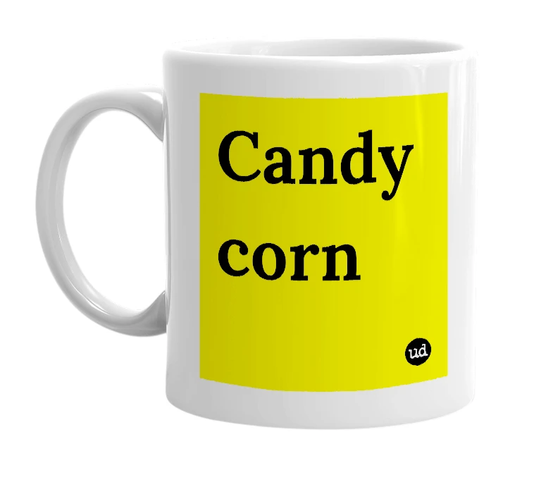 White mug with 'Candy corn' in bold black letters