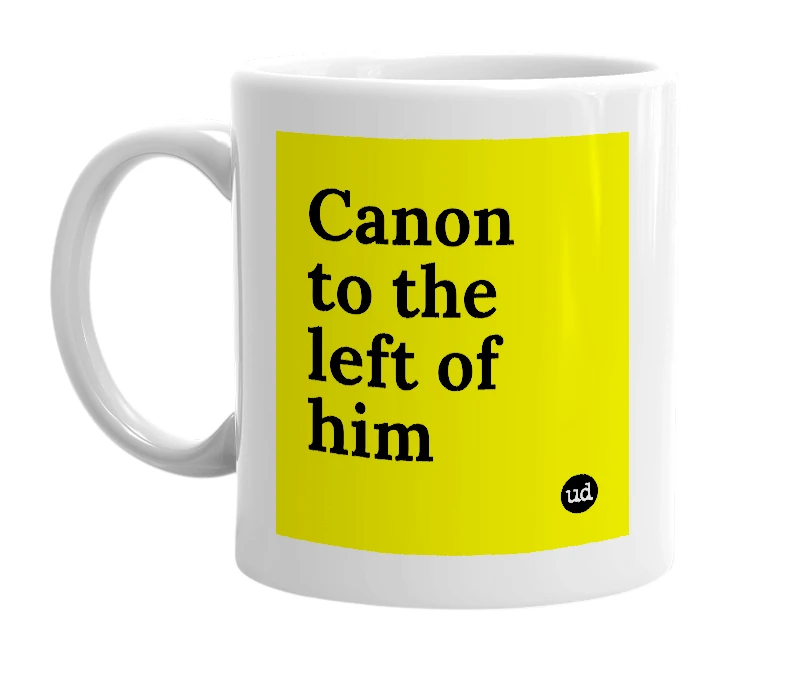 White mug with 'Canon to the left of him' in bold black letters