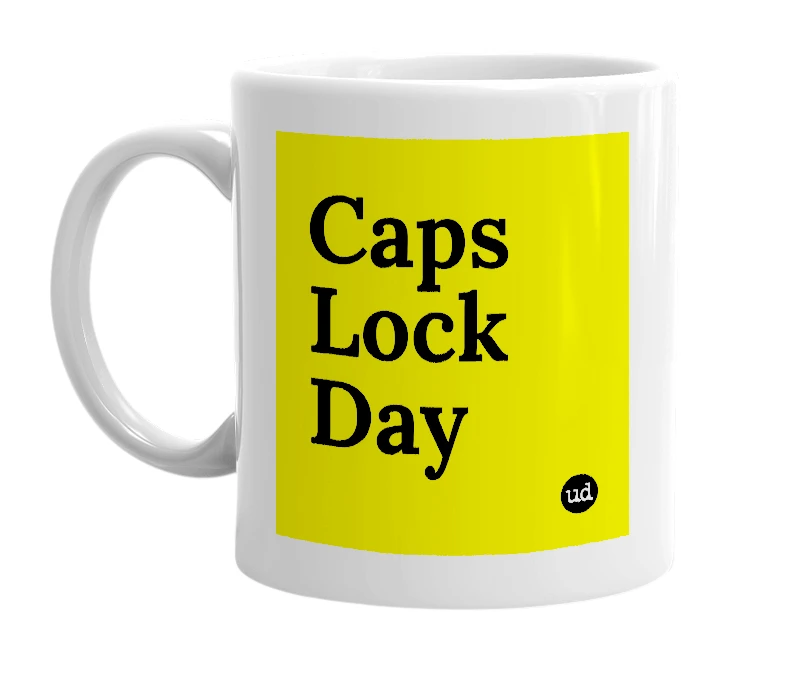 White mug with 'Caps Lock Day' in bold black letters