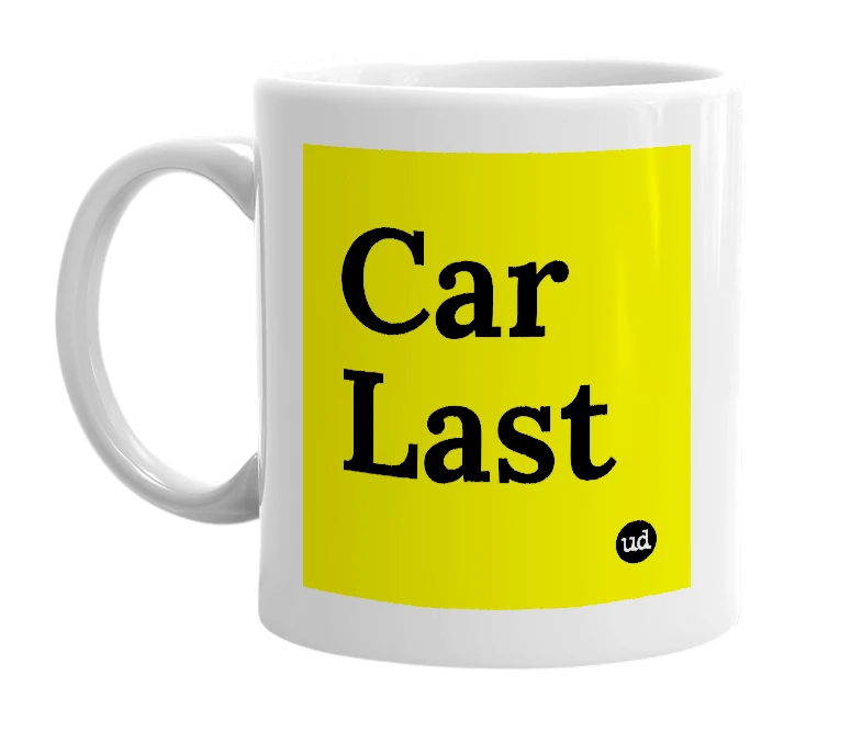 White mug with 'Car Last' in bold black letters