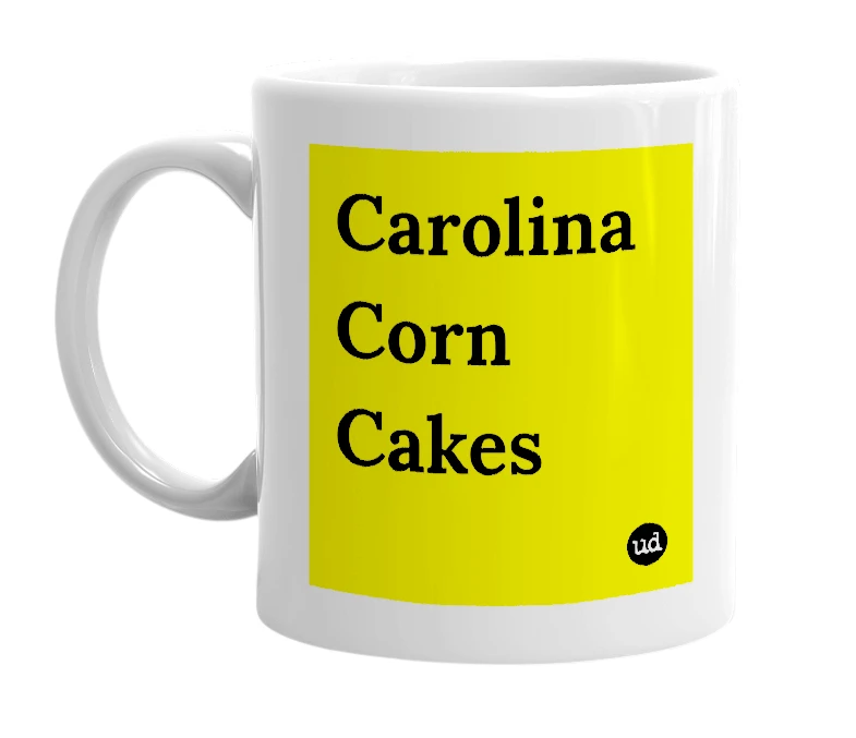 White mug with 'Carolina Corn Cakes' in bold black letters