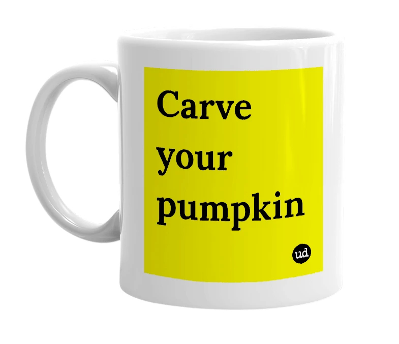 White mug with 'Carve your pumpkin' in bold black letters