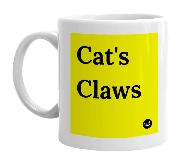 White mug with 'Cat's Claws' in bold black letters