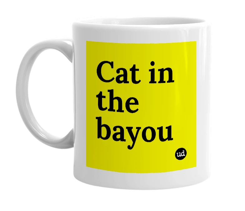 White mug with 'Cat in the bayou' in bold black letters